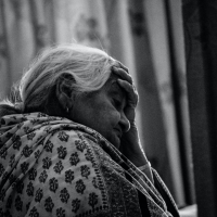 tired elderly indian woman